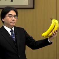 Satoru Iwata Holding Bananas