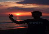 Can You Please Photoshop The Sun Between My Fingers?