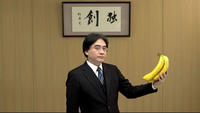 Satoru Iwata Holding Bananas