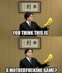 Satoru Iwata Holding Bananas